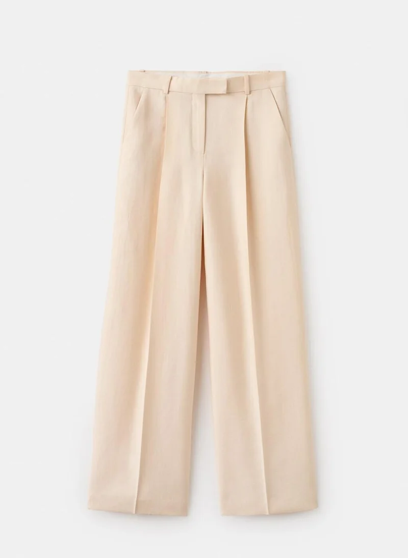 MANGO  Low-rise lyocell trousers for Women | Best Price UAE