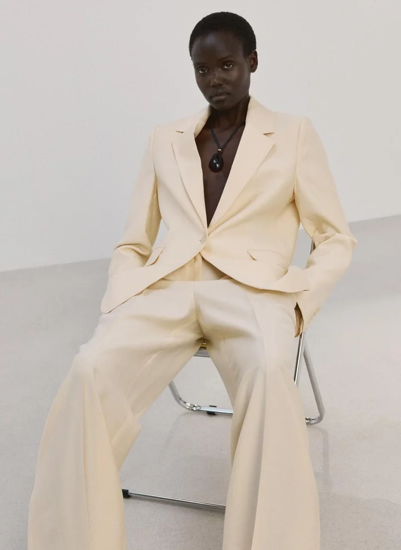 MANGO  Low-rise lyocell trousers for Women | Best Price UAE