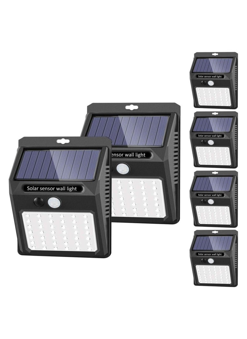 ELTRAZONE Solar Lights Outdoor [6 Pack/3 Working Mode],  Security Motion Sensor Wireless IP 65 Waterproof for Garden Fence Patio Garage (42 LED) - Image 1