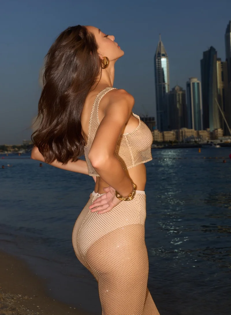 ملابس سباحة اي بي واي Cher gold net shimmer rhinestone skirt