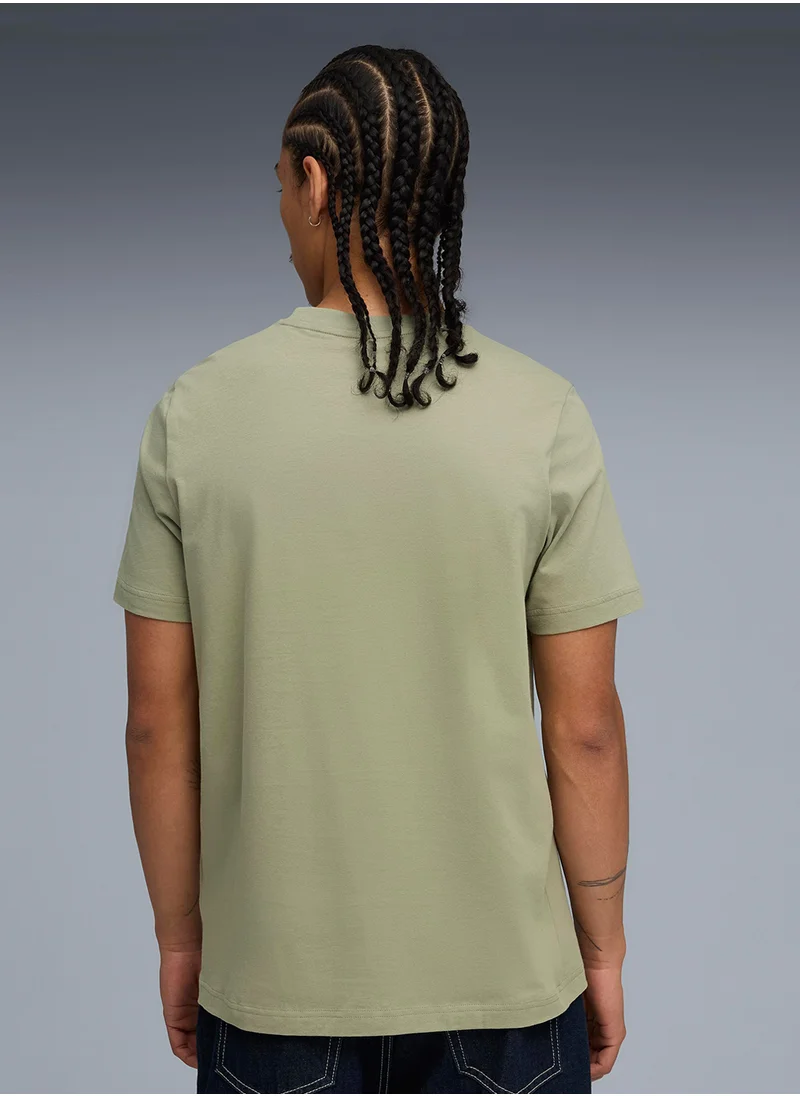 بوما Puma Men's Graphic Varsity Tee
