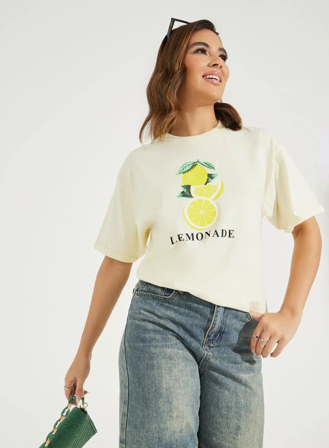 Styli Oversized Lemonade Graphic T-Shirt with Turn-Up Sleeves