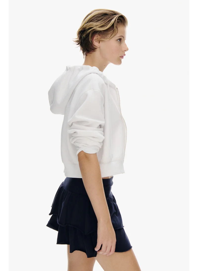 اتش اند ام Tiered jersey mini skirt