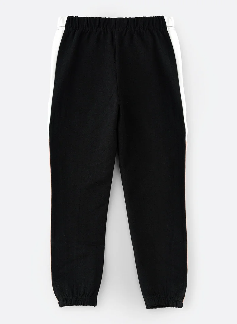 Jelliene Knitted jogger with multi fabric at side seam
