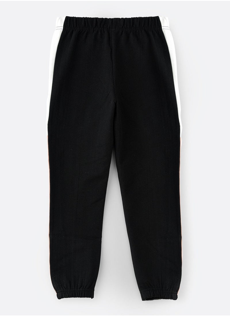 Jelliene - Knitted jogger with multi fabric at side seam - Image 1