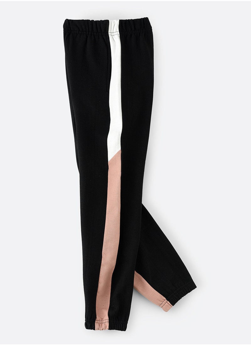 Jelliene - Knitted jogger with multi fabric at side seam - Image 1