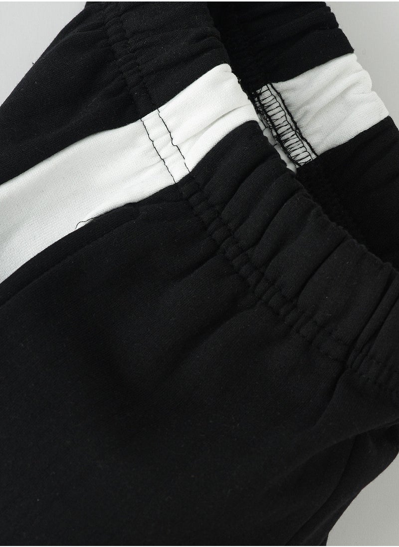 Jelliene - Knitted jogger with multi fabric at side seam - Image 1