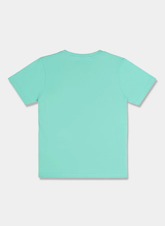 لوني تونز تيشيرت عصري بياقة مستديرة وطبعة جرافيك