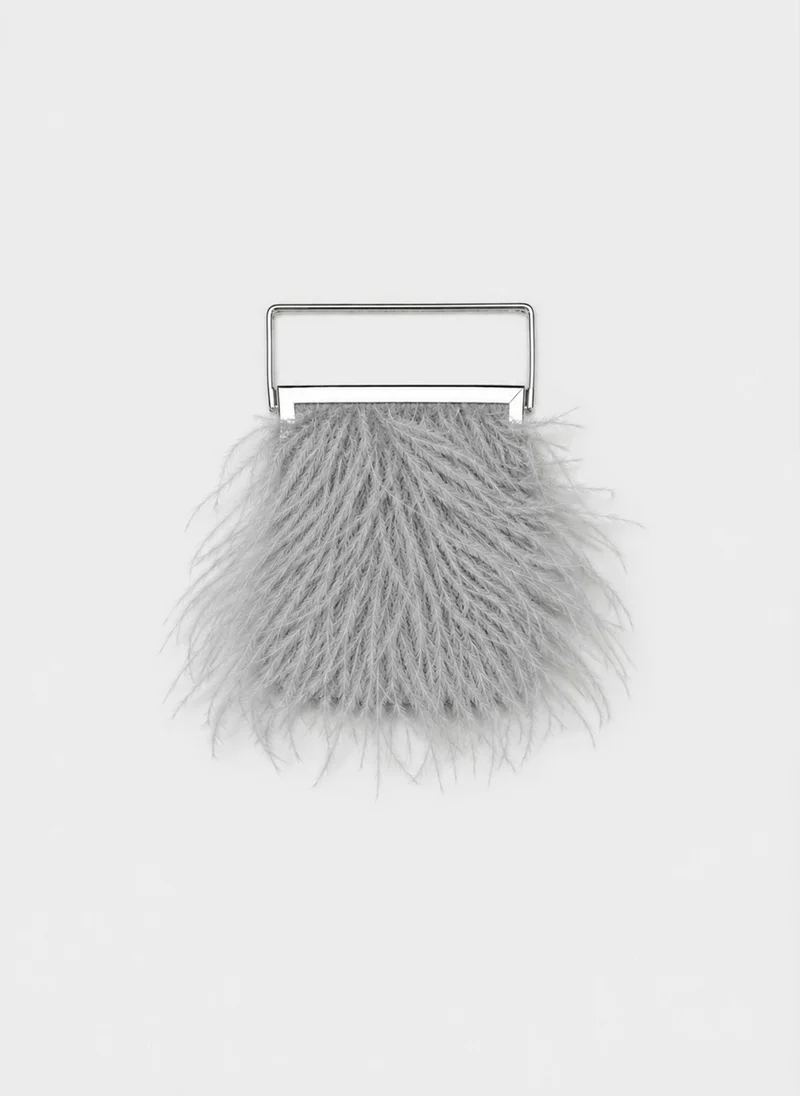 Lichi  Clutch bag with feather detailing and a metal handle for Women | Best Price UAE