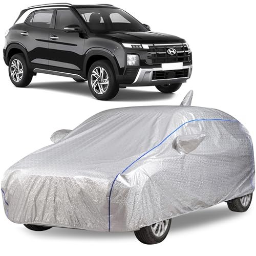 The AutoStory AutoStory Waterproof Car Body Cover for Creta 2025 Onwards | All-Weather, UV Protection, Windproof, Scratchproof | Triple Stitched with Soft Cotton Lining, Mirror Pockets, Silver with Blue Piping - Image 1
