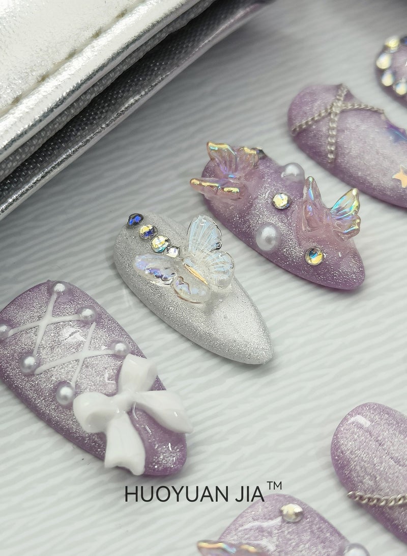 HUOYUAN JIA 10 Pieces Handmade Press On Nails,Reusable and Removable Almond Shaped French Style Fake Nails,Sparkling Purple and White Design,Butterfly, Peach Heart, Bow, Pearl and Star Decorations,Comes with A Rubbing Strip and A Piece of Jelly Glue for Fashionable Women's Holiday Gifts,Fake Nail Set  - Image 2