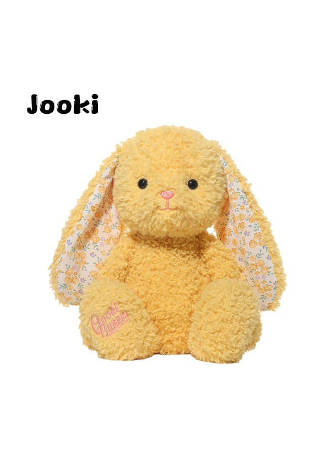 Jooki Lemon Daifuku This yellow plush rabbit was instantly captivating! Its furry ears, cleverly adorned with floral patterns, create the illusion of spring blossoming right beside them. Its gleaming black eyes seem to tell you its story, while its pink nose adds a touch of playfulness and cuteness. Its name, "Lemon Daifuku," simply sounds sweet and full of happiness. Whether you give it as a gift to a friend or keep it in your own room, this fluffy bunny will bring joy and warmth. Come spend quality time with it! - Image 1