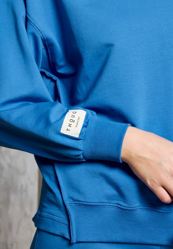 Thouq Asymmetric Hemline Extended Side Seam Sweatshirt