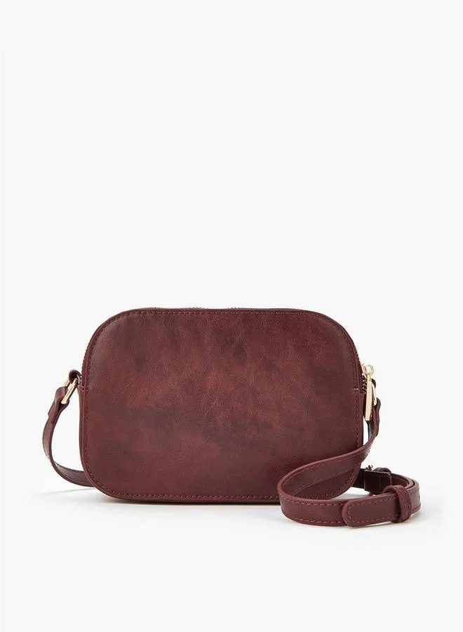 فلورا بيلا من شو إكسبرس حقيبة كروس بودي صلبة بحزام قابل للتعديل وإغلاق بسحاب