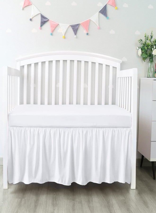 Biloban Crib Bed Skirt 28” x 52” with 14” Drop Pleated Dust Ruffle for Baby Boys Girls Elastic Adjustable Fit Toddler Bedskirt Easy On/Off Soft Nursery Standard Crib Bedding Skirts Solid White Crib Skirt - Image 1