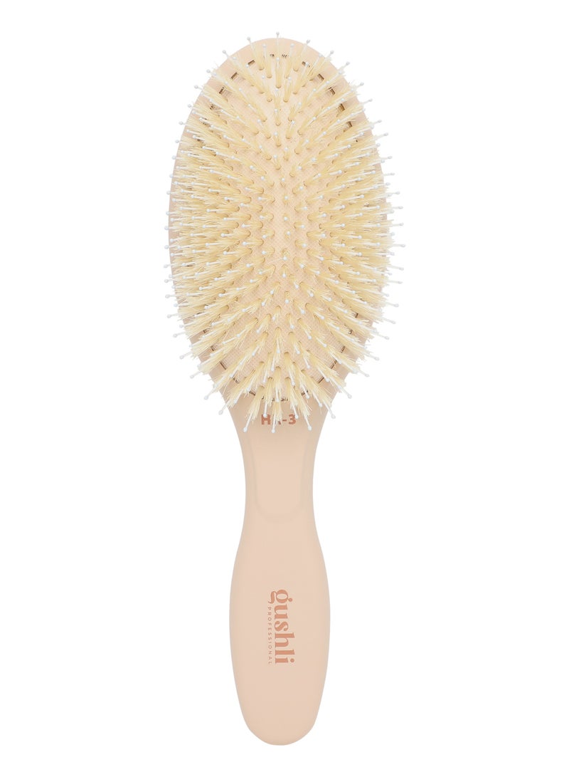 gushli Heat X-treme HX3 Paddle Brush Style and Shine features a combination of natural and nylon bristles to detangle hair while enhancing shine - Image 1