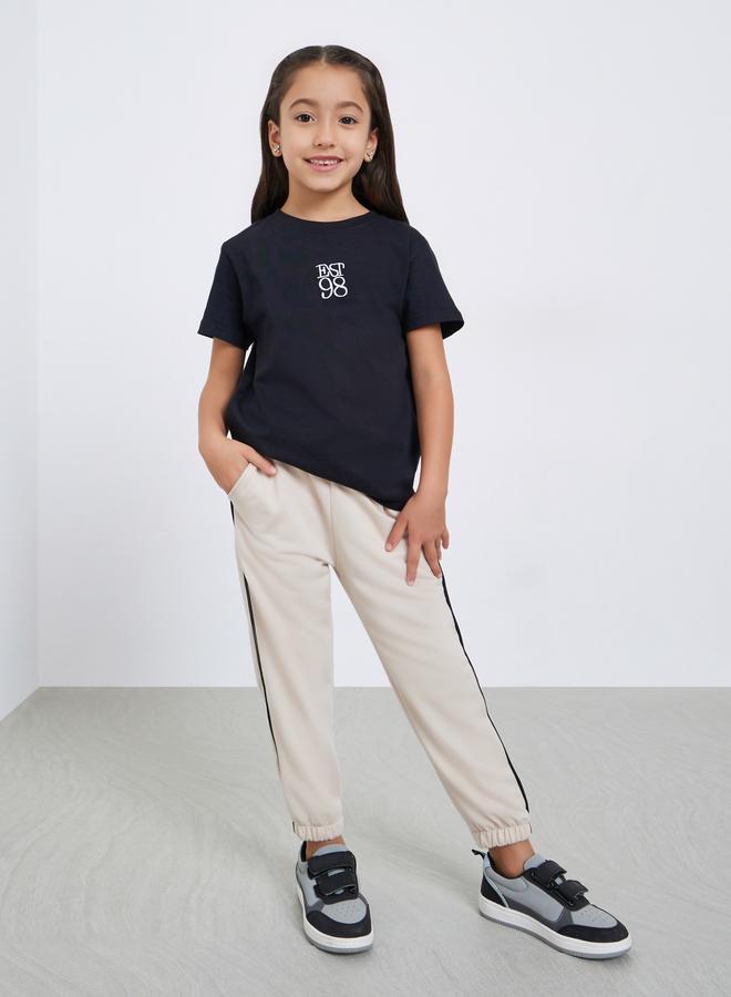 Styli Girls Beige Solid Joggers with Side Binding - Image 2