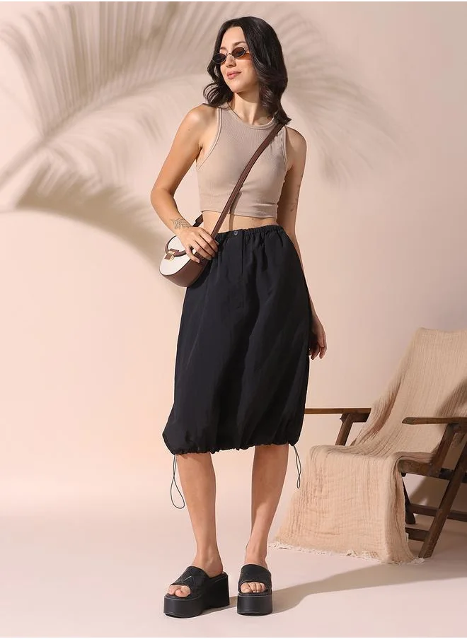 Dennis Lingo Women black regular fit solid nylon skirt with button closure- tailored to elevate your everyday.