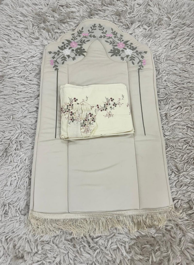 A set of sponge prayer rugs and an embroidered dress sheet 