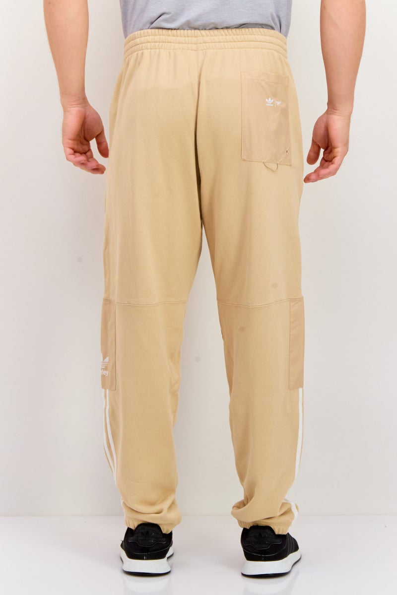 adidas Originals Men Sportswear Fit Outdoor Sweatpants, Tan  - Image 3