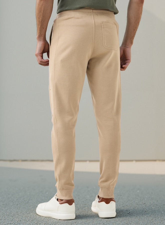 Iconic Slim Fit Joggers with Drawstring Closure and Pockets - Image 3