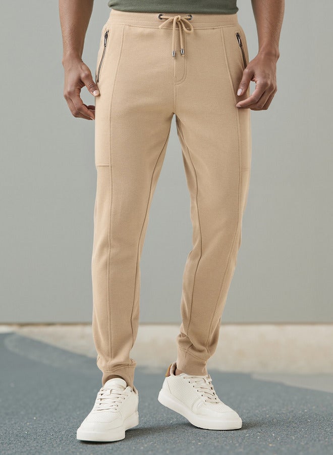 Iconic Slim Fit Joggers with Drawstring Closure and Pockets - Image 1