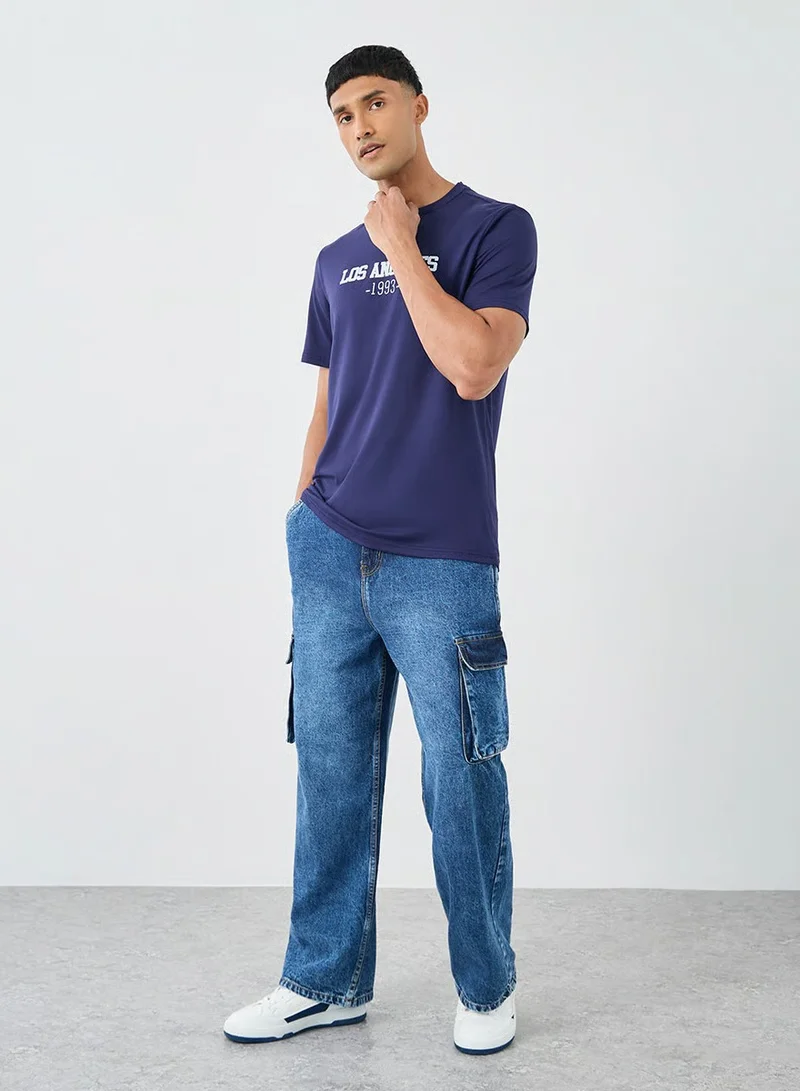 ستايلي جينز كارجو واسع الساق مغسول بخصر متوسط