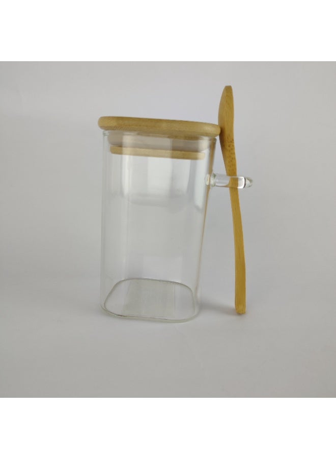 برطمان زجاج شفاف بغطاء خشب وملعقة جانبية للتخزين الأنيق - Image 1