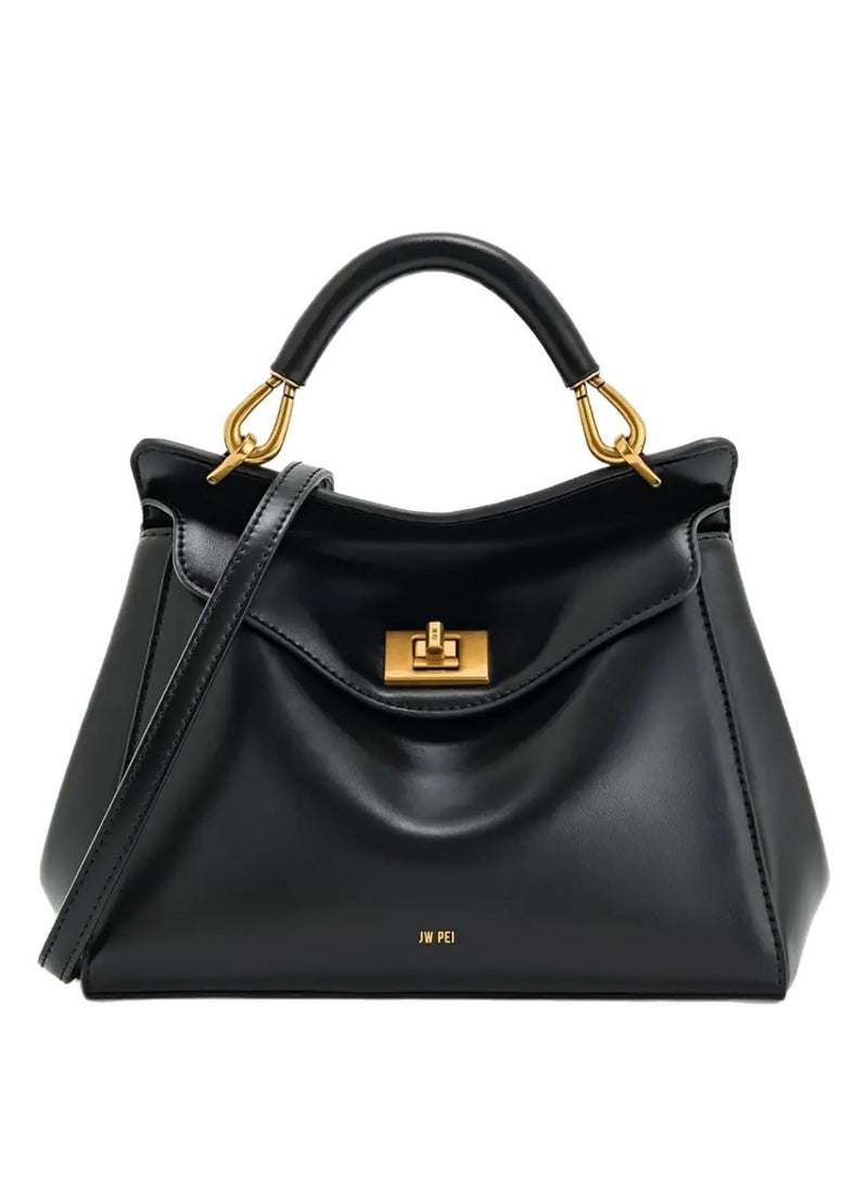 تحمل حقيبة JW Pei وهي تحمل حقيبة سفر ذهابا وإيابا