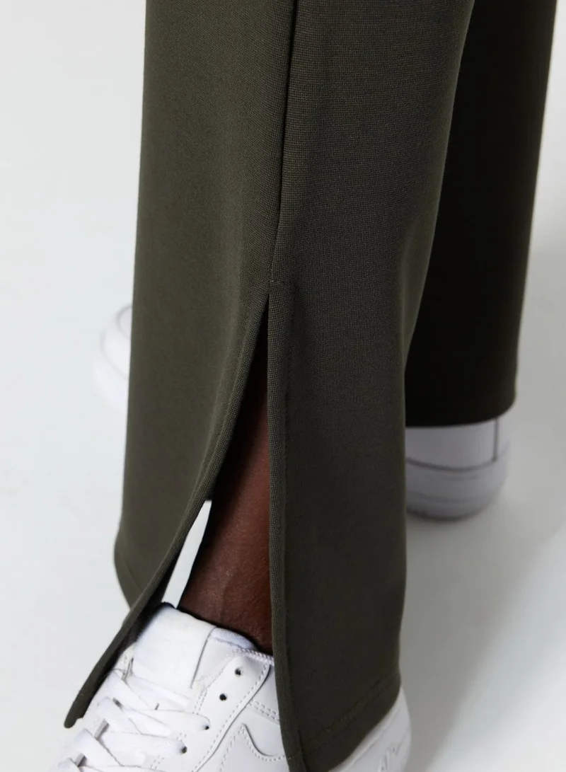 trendyol Flared Slit Hem Pants