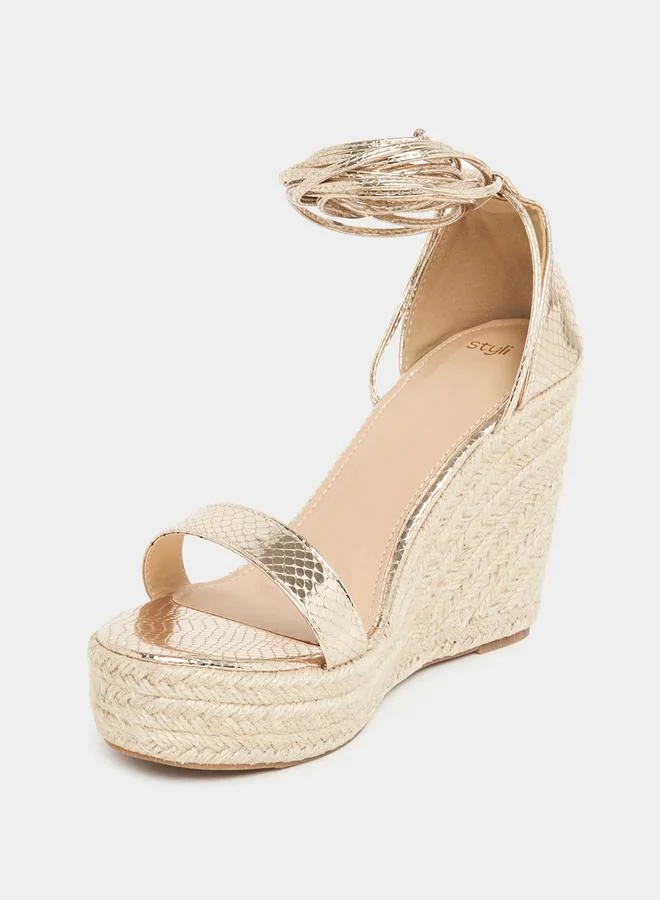 ستايلي Textured Ankle Strap Wedge Sandals