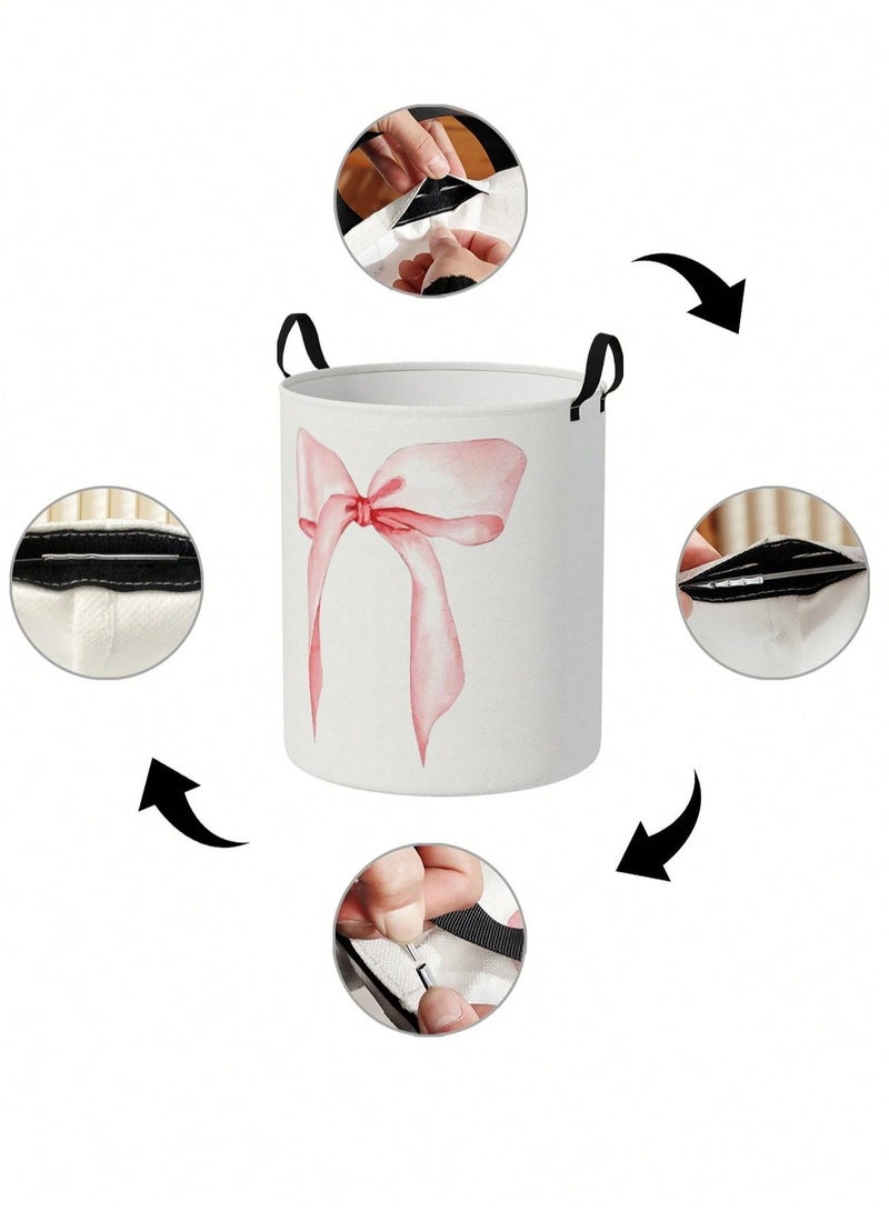 سلة غسيل ملابس قماشية باللون الأبيض مزينة بفيونكة وردية كبيرة سعة تخزين عملية مقاس 48×38 سم مع مقابض للحمل مناسبة لغرفة النوم والغسيل - Image 3