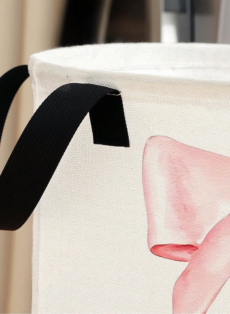 سلة غسيل ملابس قماشية باللون الأبيض مزينة بفيونكة وردية كبيرة سعة تخزين عملية مقاس 48×38 سم مع مقابض للحمل مناسبة لغرفة النوم والغسيل - Image 2