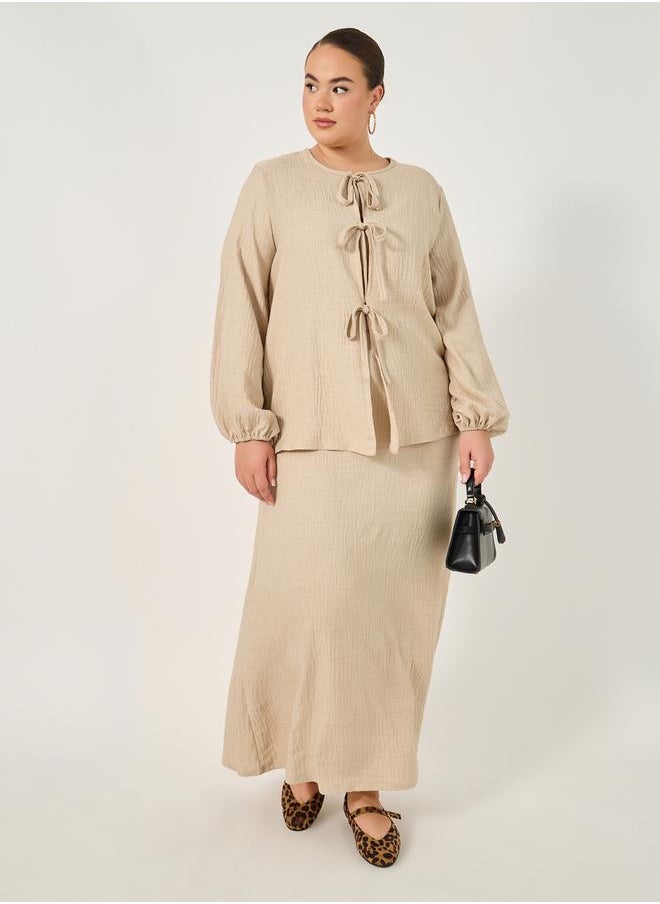 Styli Plus Size Textured Balloon Sleeve Blouse with Bow Tie-Up Detail  - Image 2