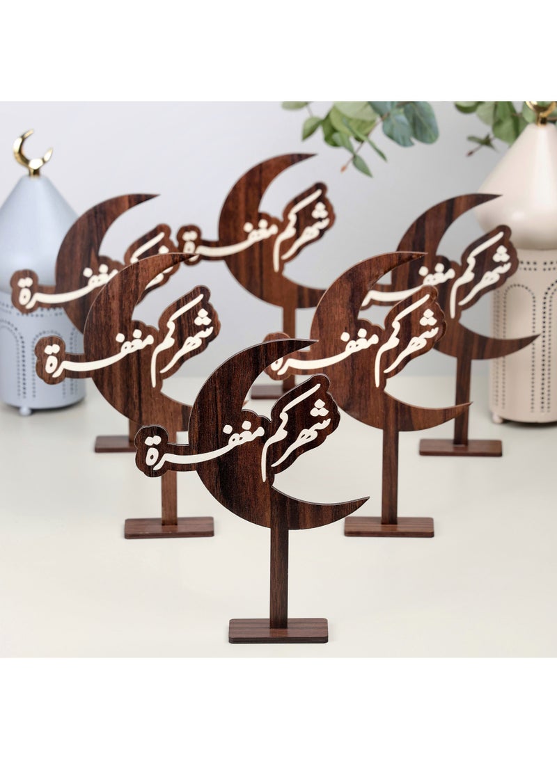 Story Of Candle Ramadan, a set of 6 Brown wooden Ramadan stands with an Arabic phrase - Image 1