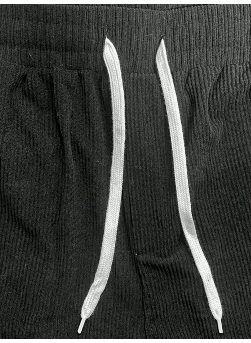 بنطلون رجالي أسود من قماش الكوردروي، واسع الساقين، بنسيج مضلع، بقصة فضفاضة، برباط، مناسب للإطلالات الكاجوال. - Image 5