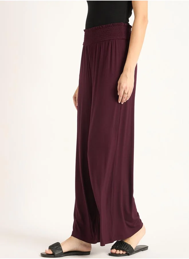 Femmella Knitted Smocking Detail Flared Pants by Styli