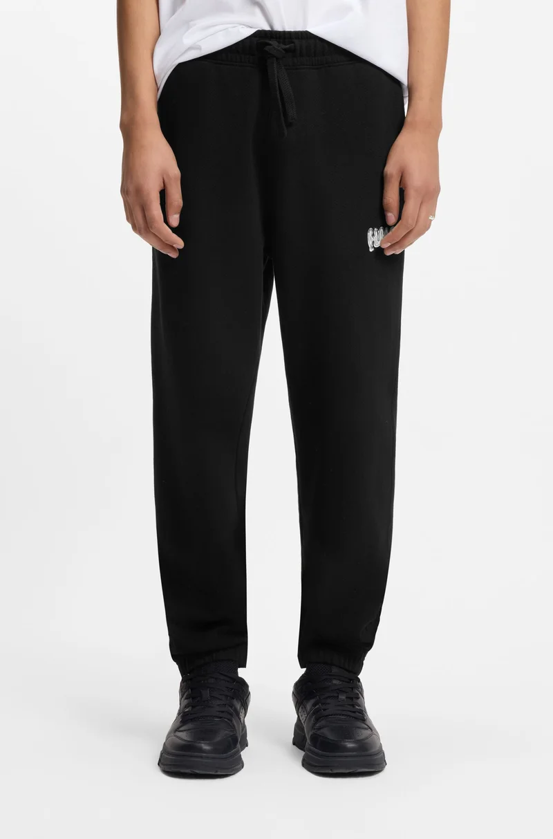 HUGO Cotton-terry tracksuit bottoms with logo print
