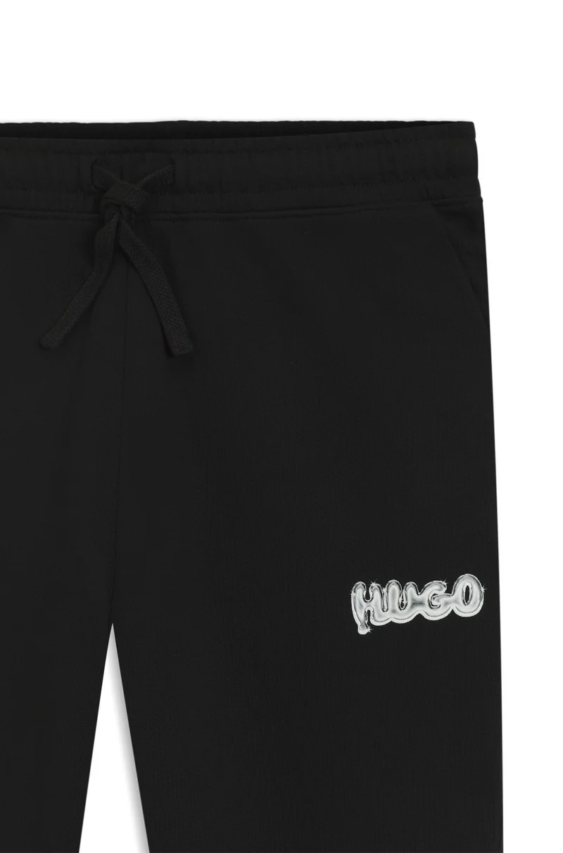 HUGO Cotton-terry tracksuit bottoms with logo print
