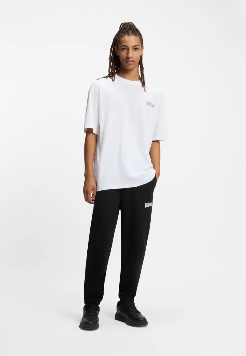 HUGO Cotton-terry tracksuit bottoms with logo print