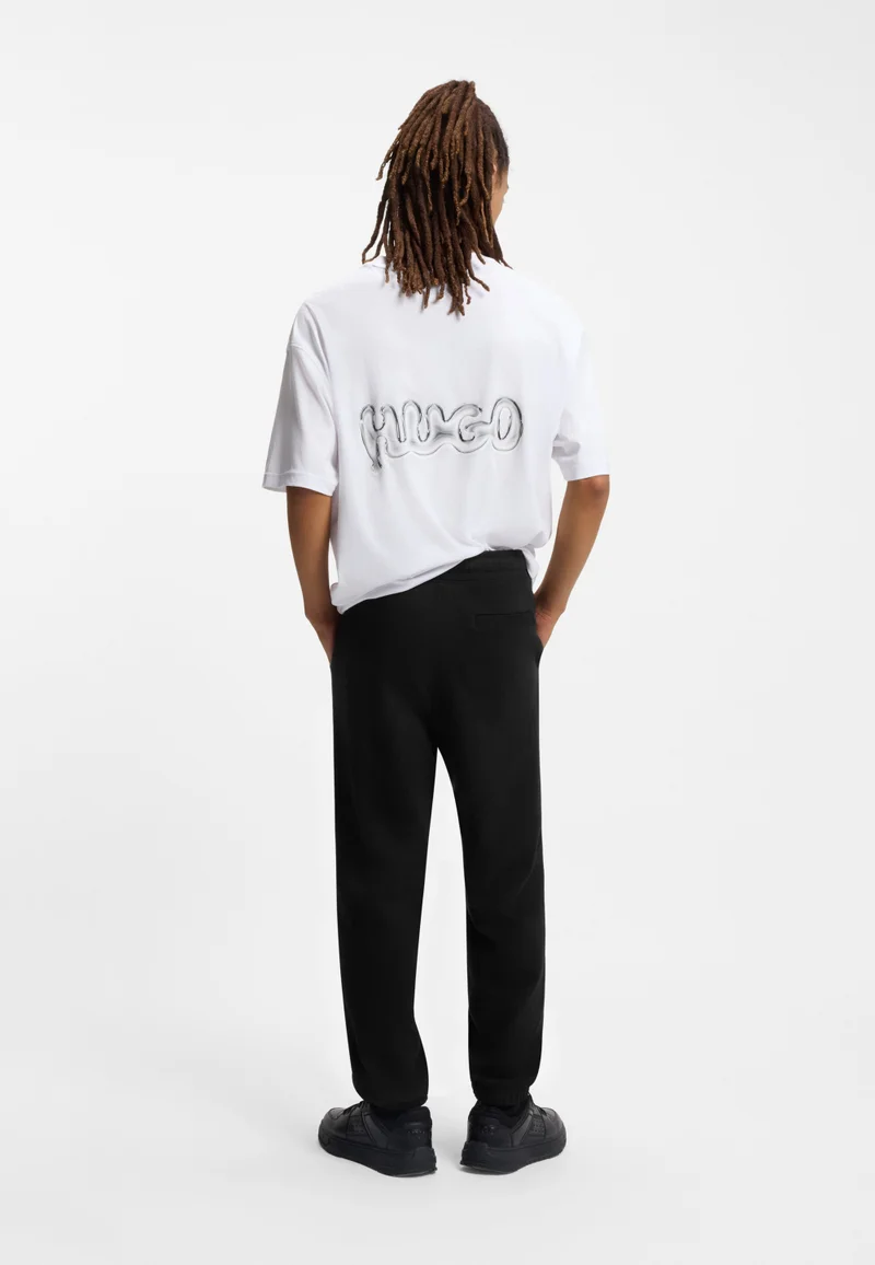 هوجو بنطلون رياضي قطني بتصميم تيري وطبعة شعار