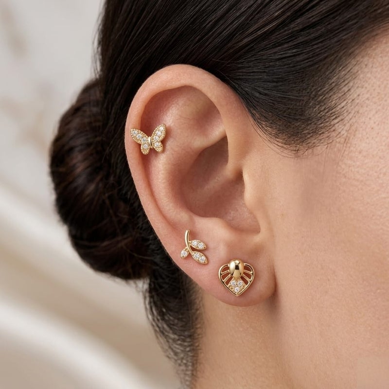 A set of 3 pairs of stud earrings in enchanting designs (butterfly, delicate branch, and sparkling heart) adorned with brilliant cubic zirconia stones. Shine with everyday versatility that combines luxury and elegance! - Image 3