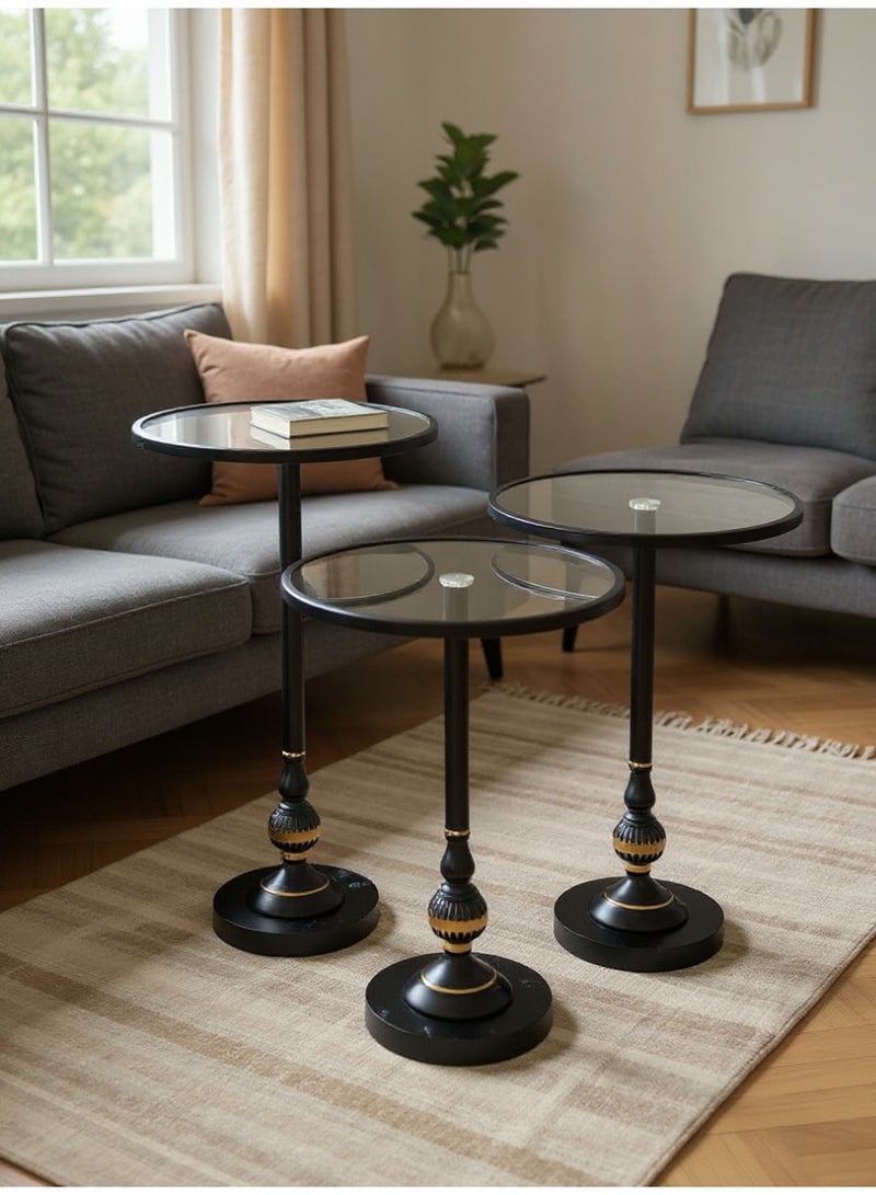 Living Set of Three Glass Tables with Black Steel Frame and Elegant Golden Touches - Image 1