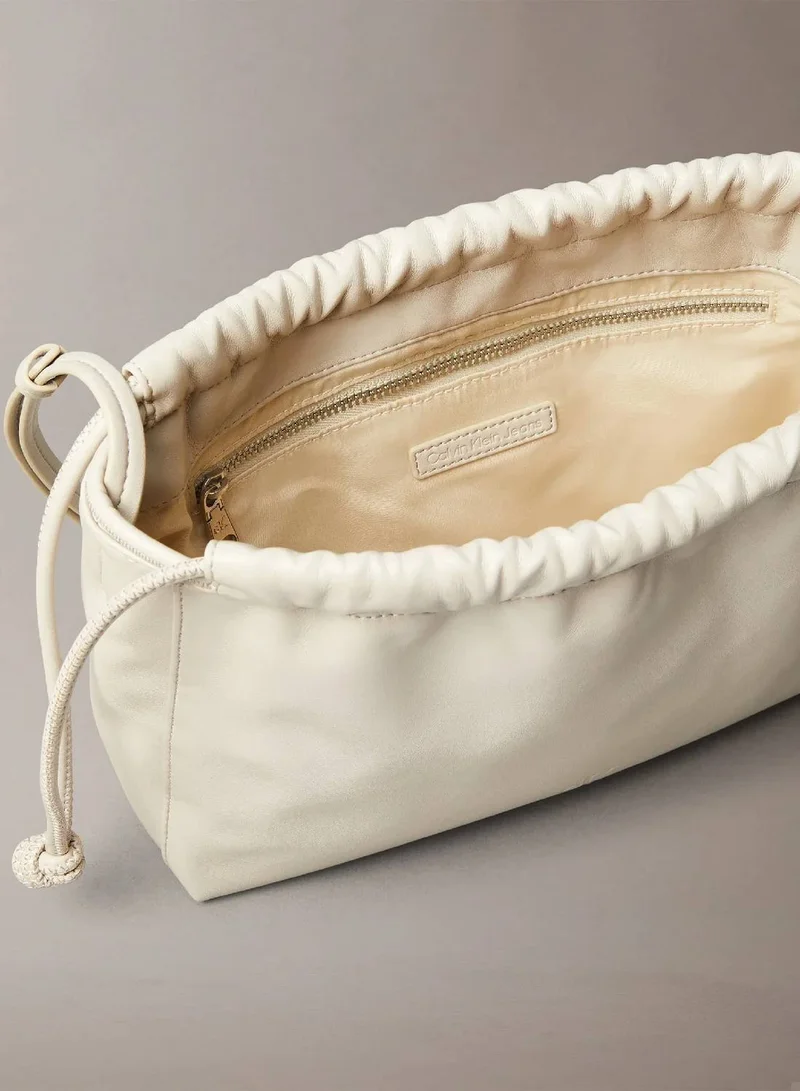 Calvin Klein Jeans Wind Chime Gathered Crossbody Bag for Women | Best Price UAE