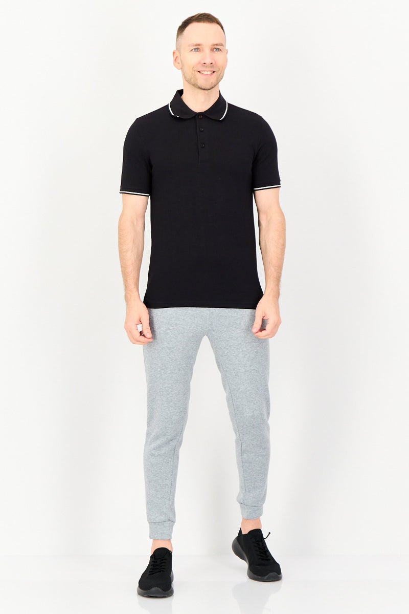 PUMA تي شيرت بولو للرجال بأكمام قصيرة مزين بشعار رياضي، خارجي، أسود - Image 3