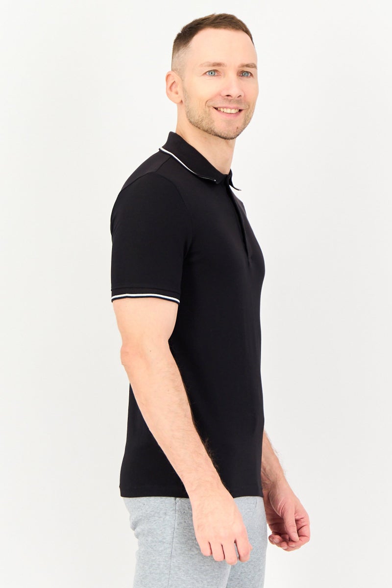 PUMA تي شيرت بولو للرجال بأكمام قصيرة مزين بشعار رياضي، خارجي، أسود - Image 4