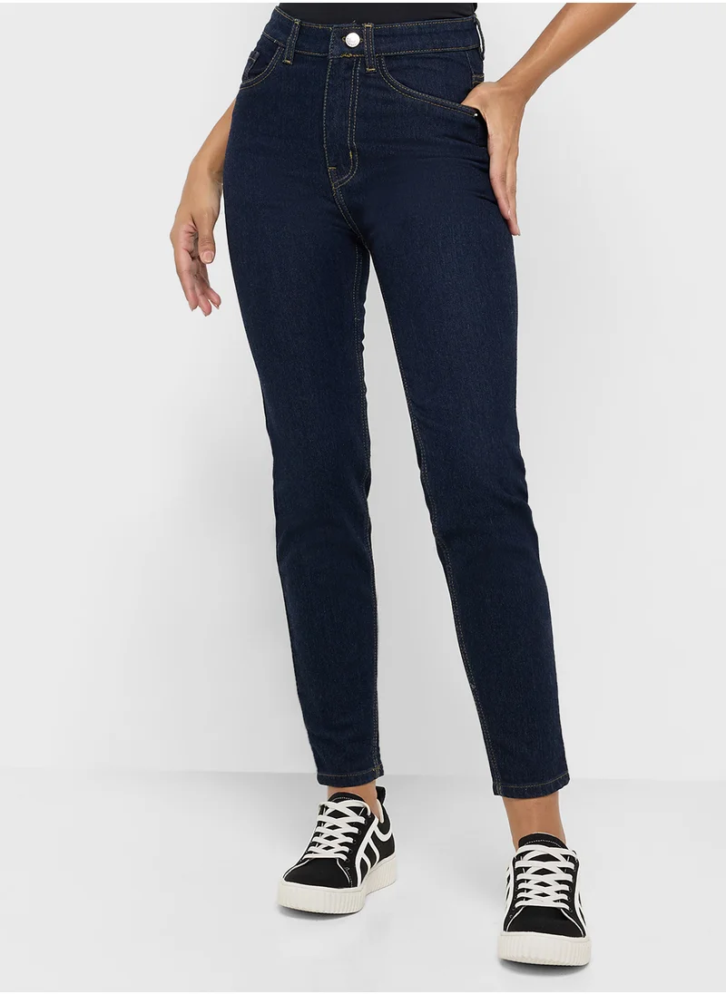 جينجر High Rise Skinny Jeans