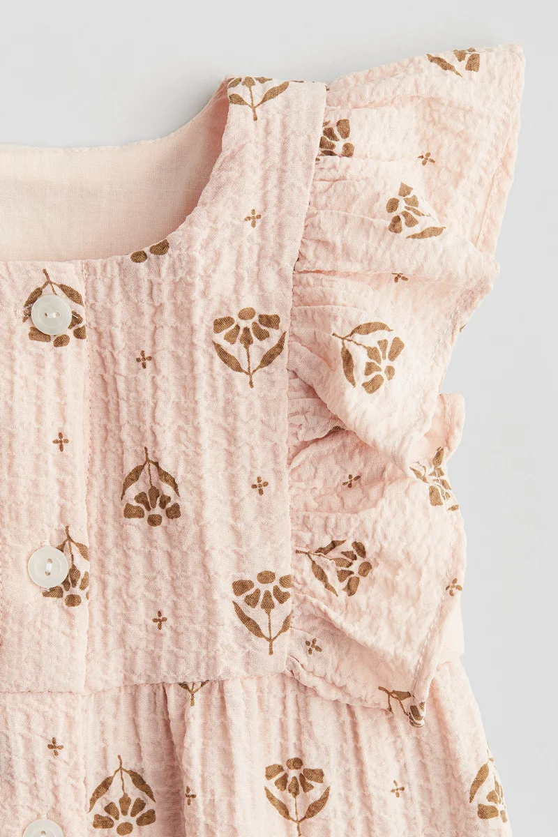 H&M Frilled muslin romper suit