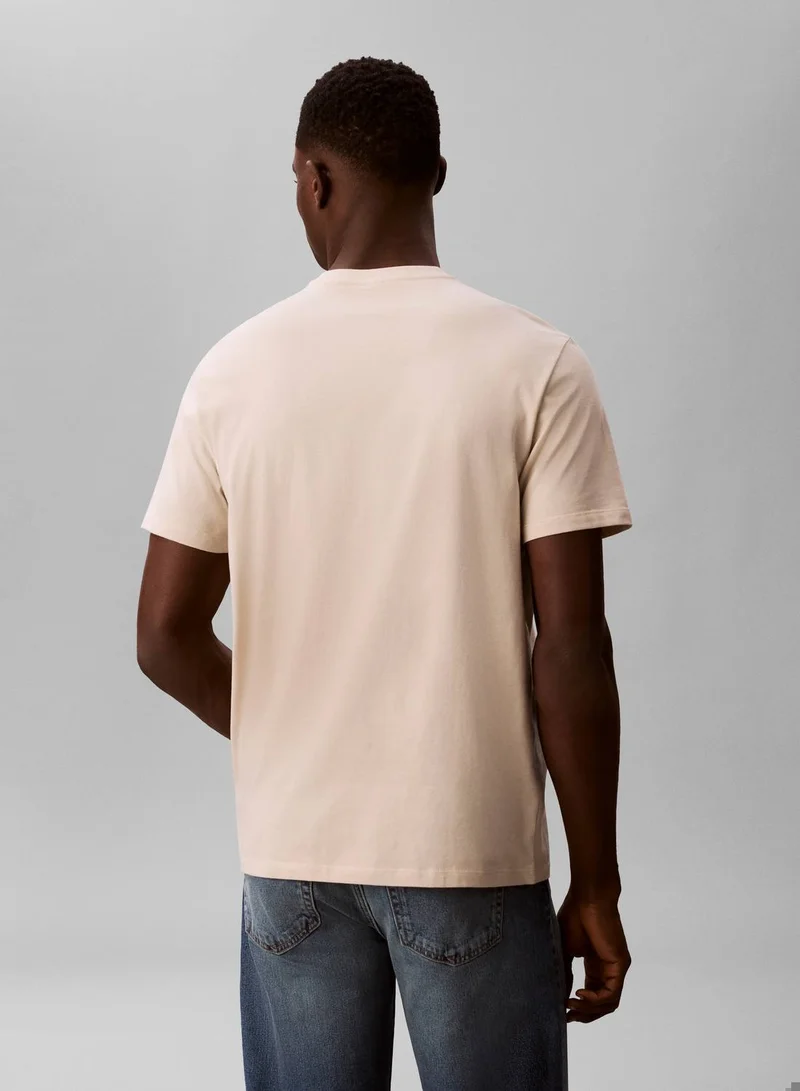 Calvin Klein Jeans Oatmeal Graphic Logo T-shirt for Men | Best Price UAE