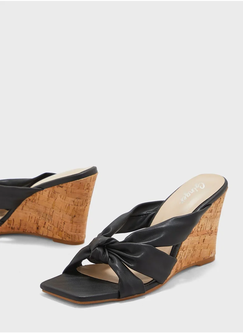 Ginger Knot-Front Leather Wedge Mules